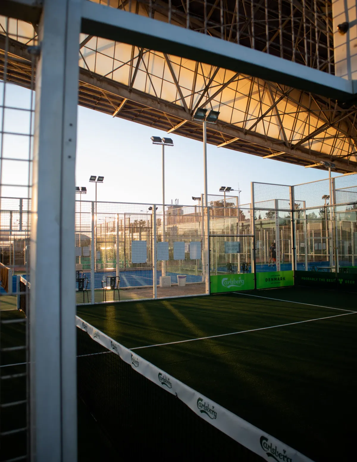 Padel courts at sunset under floodlights — Rotterdam P2 venue