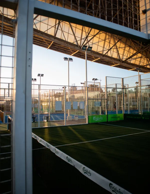 Padel courts at sunset under floodlights — Rotterdam P2 venue